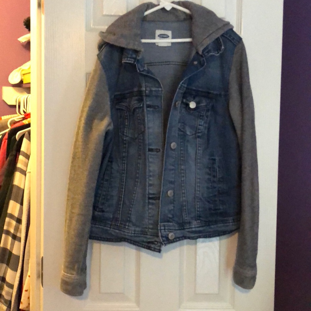 a hooded jean jacket with gray material